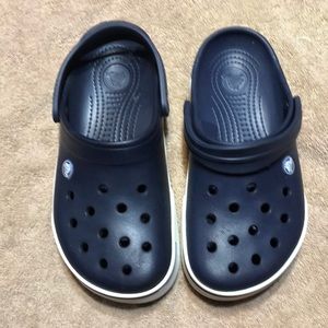 Blue and white Crocs